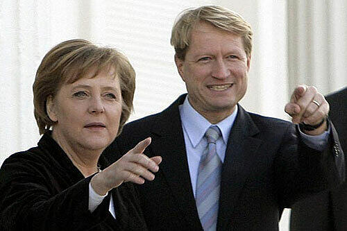 Ulrich Wilhelm neben Kanzlerin Angela Merkel