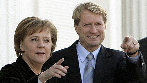 Ulrich Wilhelm neben Kanzlerin Angela Merkel Ulrich Wilhelm neben Kanzlerin Angela Merkel