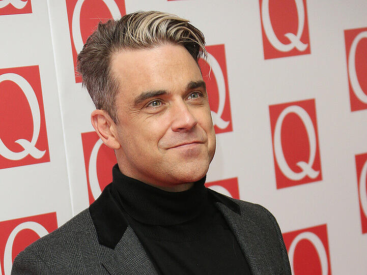 Beim Nachbarschaftsstreit mit Jimmy Page zieht Robbie Williams den Kürzeren