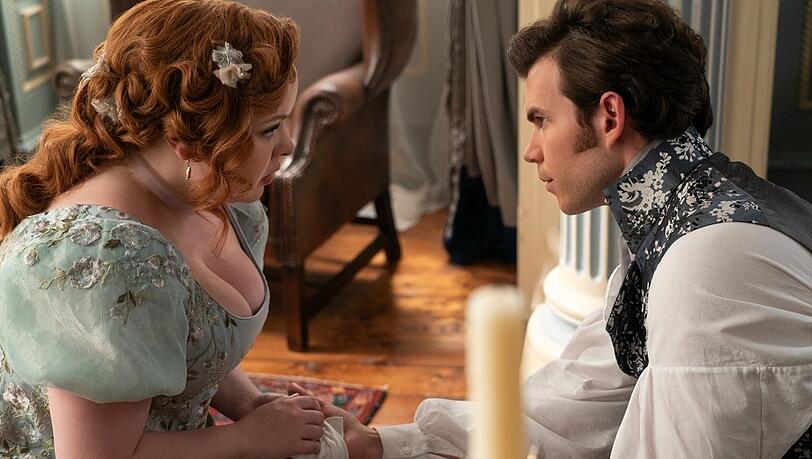 "Bridgerton": Nicola Coughlan als Penelope Featherington und Luke Newton als Colin Bridgerton in Staffel drei. "Bridgerton": Nicola Coughlan als Penelope Featherington und Luke Newton als Colin Bridgerton in Staffel drei.