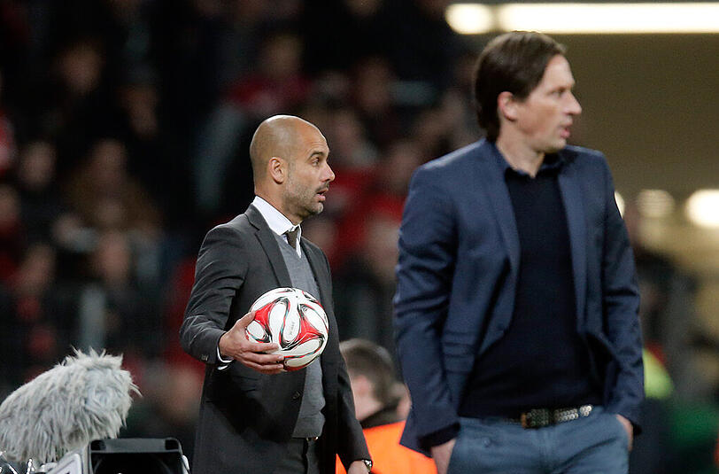 Roger Schmidt (Bayer Leverkusen, r.) oder Pep Guardiola (FC Bayern München): Wer setzt sich am Samstag im Top-Spiel der Bundesliga durch?