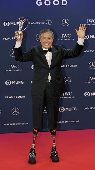 Xia Boyu, chinesicher Bergsteiger, gewann eine Trophäe.