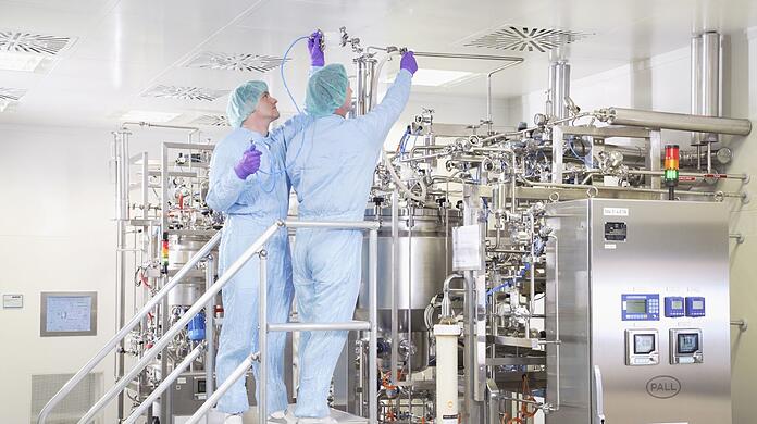 Der Impfstoff-Lieferant der Zukunft? Mitarbeiter der Novartis Influenza Vaccines bei der Arbeit.