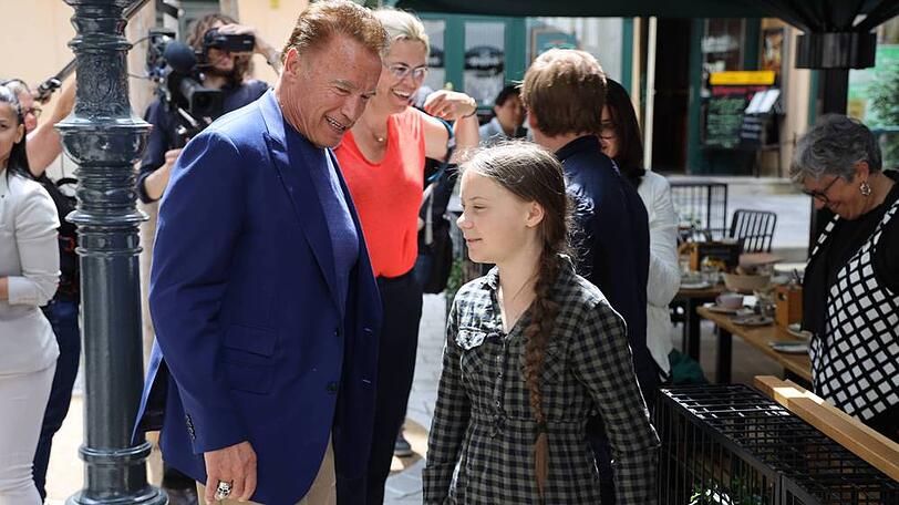 Greta Thunberg (r.) und Arnold Schwarzenegger trafen sich