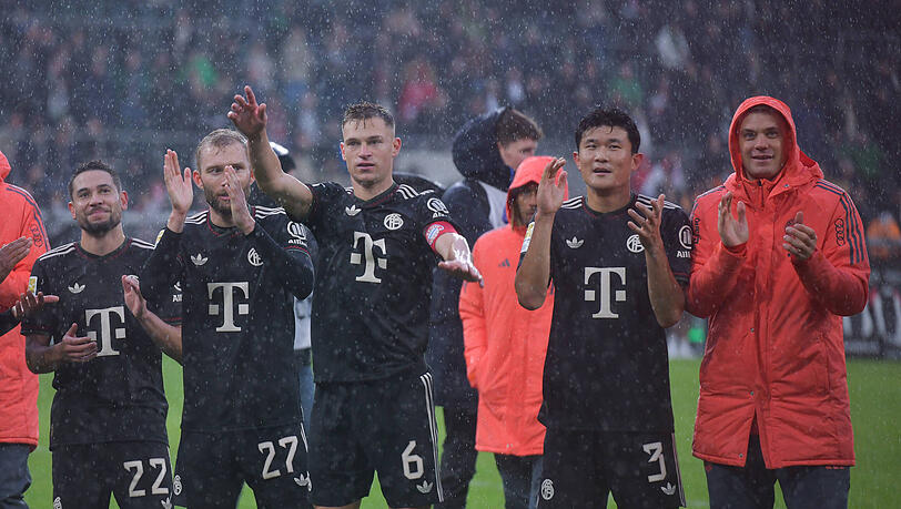 Am Mittwoch im Pokal in Köln gefordert: Der FC Bayern um Joshua Kimmich (M.). Am Mittwoch im Pokal in Köln gefordert: Der FC Bayern um Joshua Kimmich (M.).