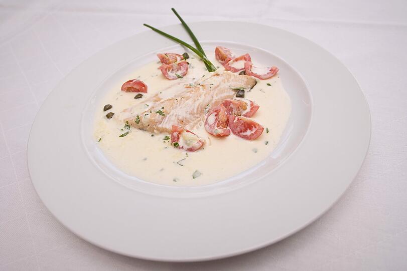 Fischfilet mit Schmortomaten
