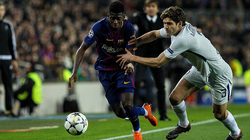 Ousmane Demebele vom FC Barcelona (links) im Zweikampf mit Marcos Alonso vom FC Chelsea.
