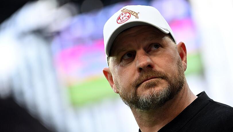 Meister-Prämie oder Krach mit der Ehefrau: Kölns-Kulttrainer Steffen Baumgart muss sich entscheiden.