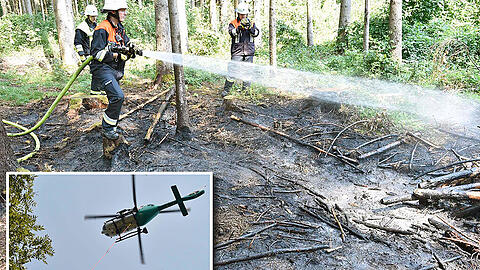 Mit vereinten Kräften. Aus der Luft und vom Boden aus rückten die Einsatzkräfte zu dem Waldbrand vor.