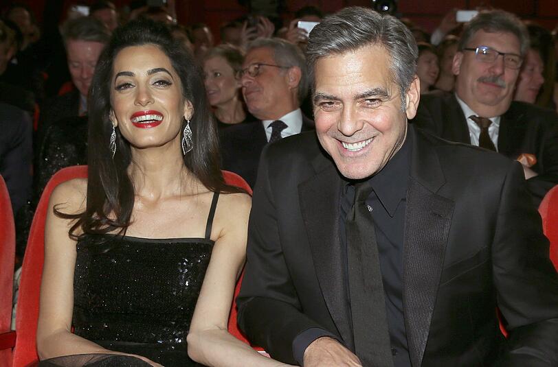 Amal und George Clooney gut gelaunt bei der Berlinale
