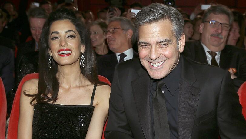 Amal und George Clooney gut gelaunt bei der Berlinale