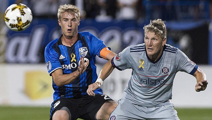 Bastian Schweinsteiger (rechts) im Duell mit Kyle Fisher von Montreal. Bastian Schweinsteiger (rechts) im Duell mit Kyle Fisher von Montreal.