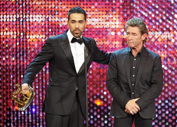 ...das dem Rapper wie Laudator Peter Maffay wohl eher mit gemischten Gefühlen gegenüberstand.