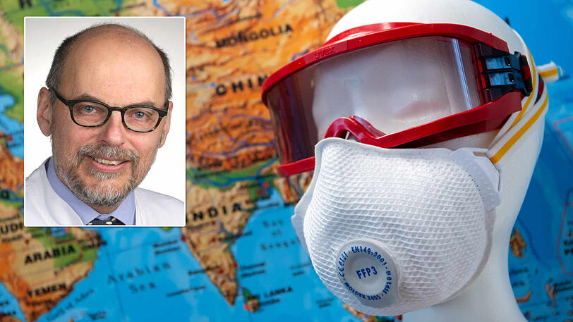 Ein Mundschutz und eine Schutzbrille in einem Besprechungszimmer der "Task-Force Infektiologie" am Flughafen München. Die AZ hat mit dem Regensburger Experten für Infektologie, Prof. Dr. Bernd Salzberger, gesprochen.