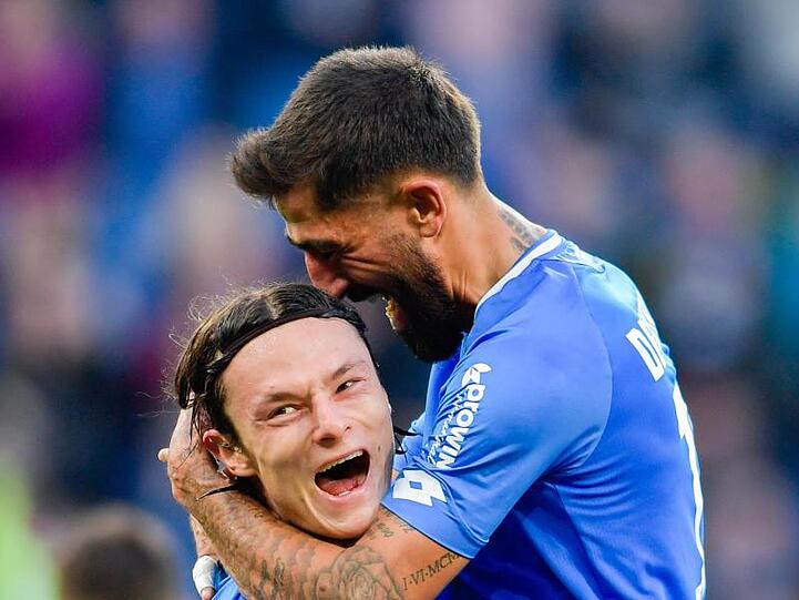Kerem Demirbay (r) und Nico Schulz von der TSG 1899 Hoffenheim jubeln. Foto: Uwe Anspach/Archiv