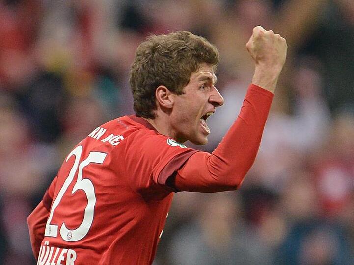 Münchens Thomas Müller bejubelt sein Tor zum 1:0. Foto: Andreas Gebert/Archiv