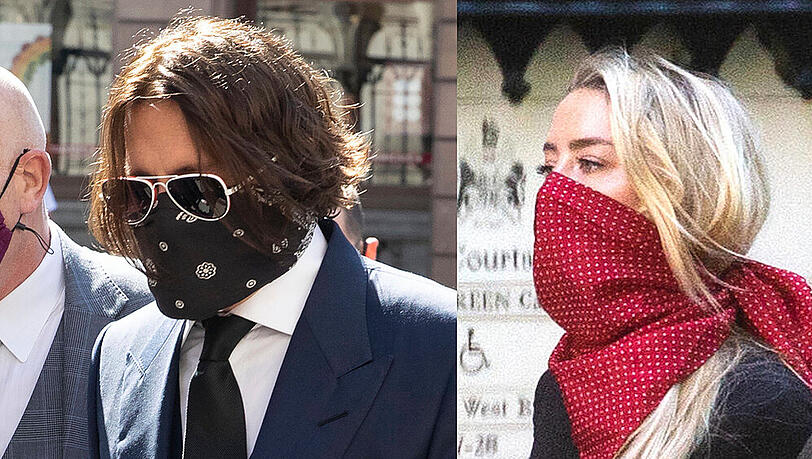 Johnny Depp und Amber Heard mit Mund-Nasen-Schutz am Dienstag (7. Juli) auf dem Weg in ein Londoner Gericht. Johnny Depp und Amber Heard mit Mund-Nasen-Schutz am Dienstag (7. Juli) auf dem Weg in ein Londoner Gericht.
