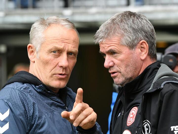 Die beiden Trainer Christian Streich und Friedhelm Funkel sind sich in ihrer Kritik am Videobeweis einig.