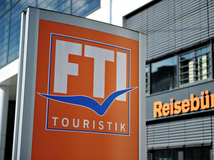 Das Logo des Reiseveranstalters FTI-Touristik ist zu sehen. Foto: picture alliance / dpa/Archivbild