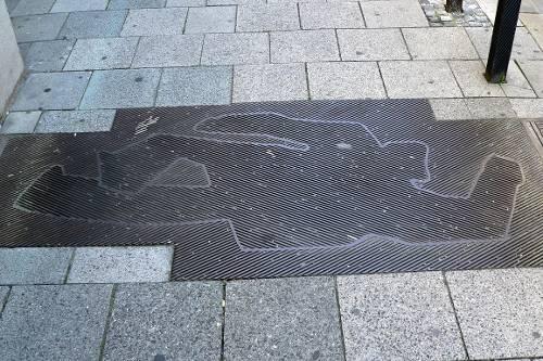 Eine Leiche! Der Umriss welches toten Politikers ist hier zu sehen?