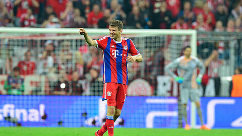 Thomas Müller jubelt über sein Tor zum 4:0 gehen den FC Porto. Es war sein Treffer Nummer 27 in der Königsklasse.