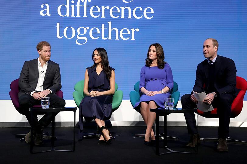 Prinz Harry mit Meghan Markle und Herzogin Kate mit Prinz William beim Forum der Stiftung "Royal Foundation". Die Brüder gründeten die Stiftung im Jahr 2011.