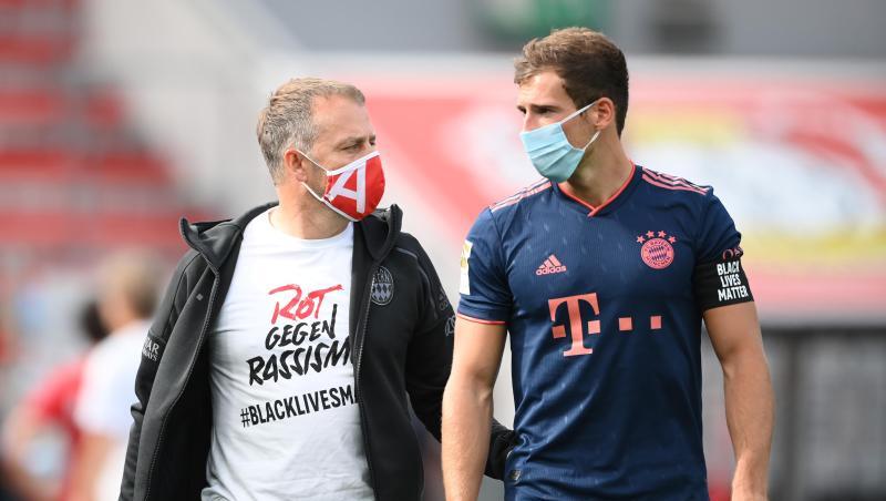 Münchens Trainer Hansi Flick mit Spieler Leon Goretzka. Foto: Matthias Hangst/Getty Images Europe/Pool/dpa Münchens Trainer Hansi Flick mit Spieler Leon Goretzka. Foto: Matthias Hangst/Getty Images Europe/Pool/dpa