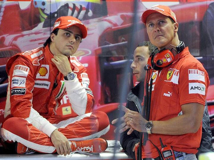Felipe Massa (l) und Michael Schumacher fuhren gemeinsam für das Team Ferrari.