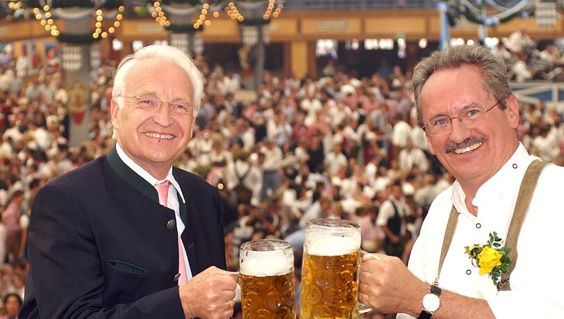 Anstoßen beim Trachtenumzug: Ausgerechnet Edmund Stoiber (l., CSU) hat Christian Ude (SPD) Kandidatur bei der Landtagswahl ermuntert. Anstoßen beim Trachtenumzug: Ausgerechnet Edmund Stoiber (l., CSU) hat Christian Ude (SPD) Kandidatur bei der Landtagswahl ermuntert.