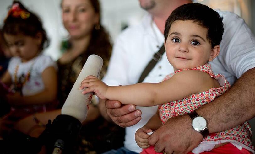 In Sicherheit: Dieses irakische Mädchen kam mit ihrer Familie und weiteren Landsleuten in Deutschland.