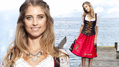 Doch ein bisserl sexier als jeder Fanschal: Cathy Hummels im EM-Dirndl von Angermaier.