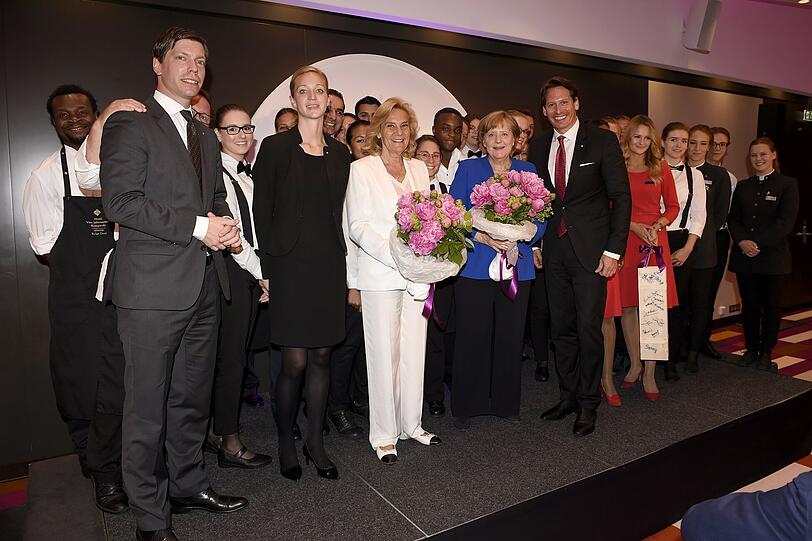 Susanne Porsche, Angela Merkel, Axel Ludwig und Team