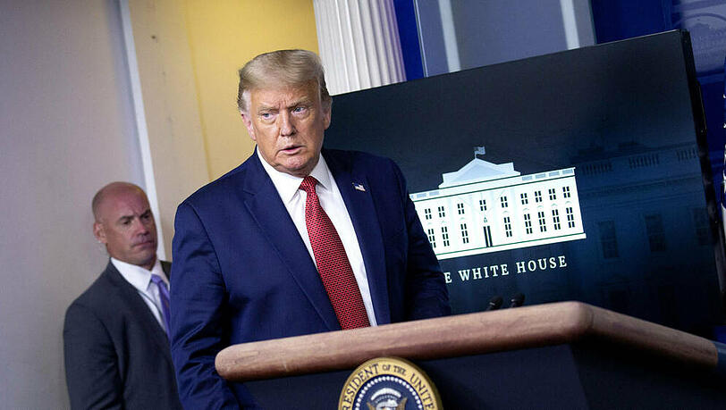 US-Präsident Donald Trump muss die Pressekonferenz verlassen US-Präsident Donald Trump muss die Pressekonferenz verlassen