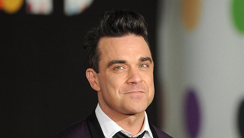 Kehrt Robbie Williams bald zu seinen Ex-Kollegen von Take That zurück? Kehrt Robbie Williams bald zu seinen Ex-Kollegen von Take That zurück?