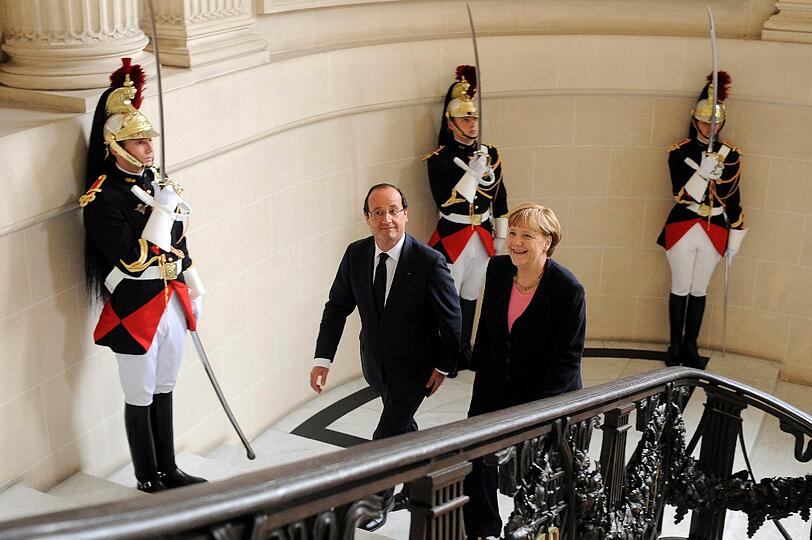 Merkel und Hollande feiern in Reims deutsch-französische Freundschaft. Die Bilder