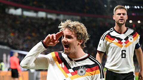 Nick Woltemade jubelt &uuml;ber ein Tor im DFB-Trikot (Archivbild).