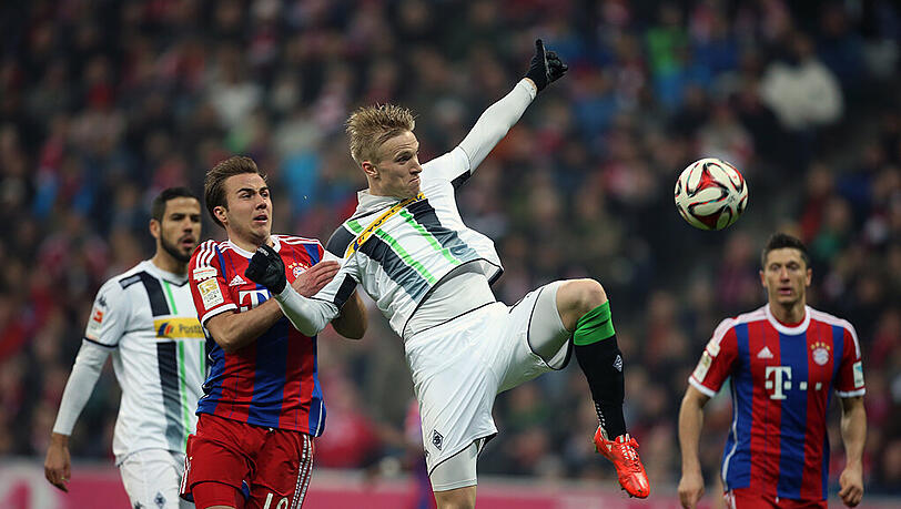 FC Bayern gegen Borussia Mönchengladbach - das ist oft ein Duell auf Augenhöhe und fast immer spannend. Im Bild der Münchner Mario Götze im Zweikampf mit dem Gladbacher Oscar Wendt. FC Bayern gegen Borussia Mönchengladbach - das ist oft ein Duell auf Augenhöhe und fast immer spannend. Im Bild der Münchner Mario Götze im Zweikampf mit dem Gladbacher Oscar Wendt.