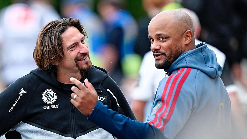 Bayern-Trainer Vincent Kompany (r) würde in der nächsten Saison gern wieder nach Elversberg kommen. Bayern-Trainer Vincent Kompany (r) würde in der nächsten Saison gern wieder nach Elversberg kommen.
