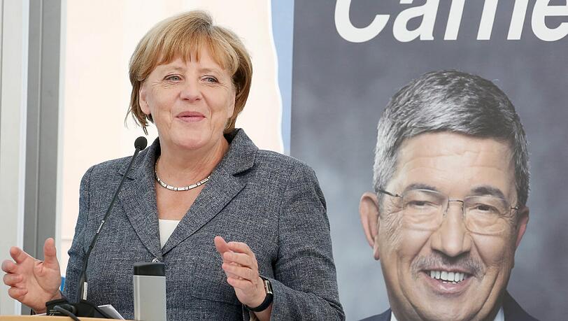Kanzlerin Angela Merkel weist einen Zusammenhang zwischen der gewachsenen Terrorgefahr und dem Zuzug von Flüchtlingen zurück. Foto: Bernd Wüstneck Kanzlerin Angela Merkel weist einen Zusammenhang zwischen der gewachsenen Terrorgefahr und dem Zuzug von Flüchtlingen zurück. Foto: Bernd Wüstneck