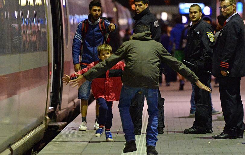 20 000 Flüchtlinge sind am Wochenende in München angekommen. Die Bilder vom Hauptbahnhof.