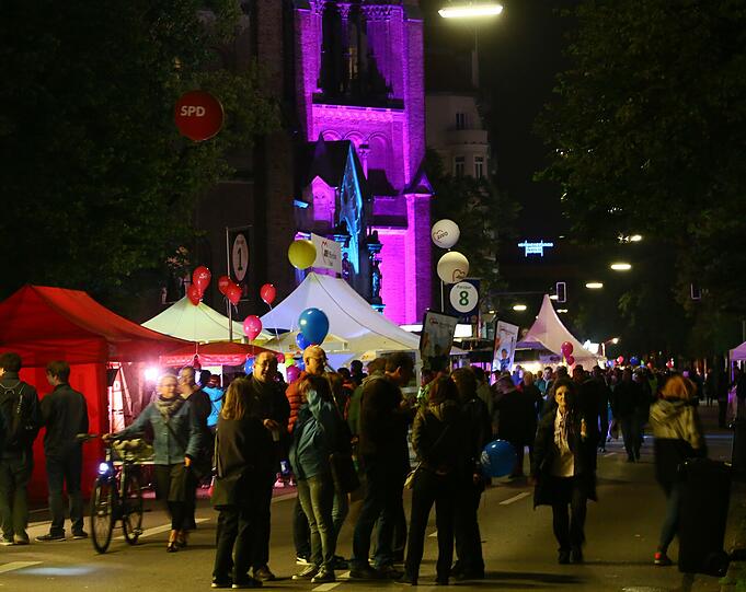 Das Isarinselfest trotzt dem nasskalten Herbstanfang - die Bilder vom Wochenende zum Durchklicken.