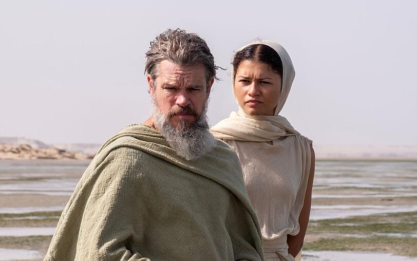 Christopher Nolan konnte zahlreiche Superstars f&uuml;r "Die Odyssee" gewinnen. Im Bild: Matt Damon als Odysseus und Zendaya als Athena.