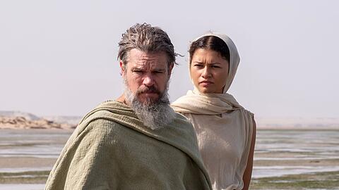 Christopher Nolan konnte zahlreiche Superstars f&uuml;r "Die Odyssee" gewinnen. Im Bild: Matt Damon als Odysseus und Zendaya als Athena.
