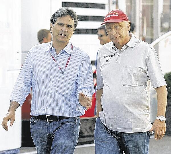 Nelson Piquet, hier links neben Niki Lauda, soll BMW-Sauber kaufen wollen.