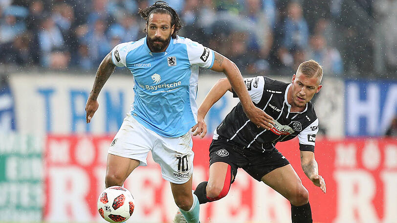 Kampf um jeden Ball: Löwe Adriano Grimaldi (li.).
