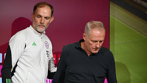 Thomas Tuchel (li..) und Christian Streich treffen am Freitagabend erneut aufeinander.