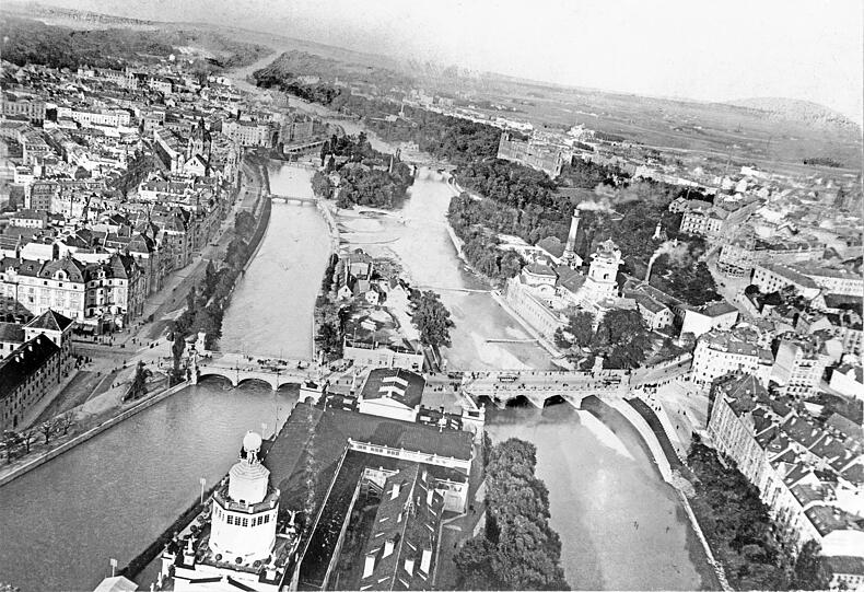 Die Aufnahme zeigt die alte Ludwigsbrücke, rechts dahinter das Volksbad.