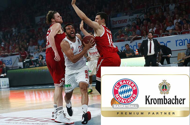 Der Bamberger Elias Harris tankt sich durch die beiden Münchner John Bryant (links) und Paul Zipser hindurch.
