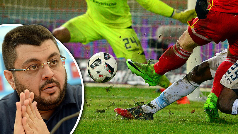 Schwieriges Geläuf: In Berlin flogen die Rasenfetzen, hoppelte der Ball. Ismaik übt Kritik.