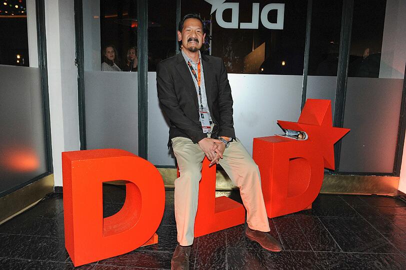 David Liu (Jefferies) beim Posieren auf der DLD-Party.